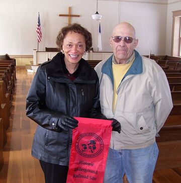 Cathy Nelson, Founder of the Friends of Freedom Society,and John Ittel in Hopewell Church